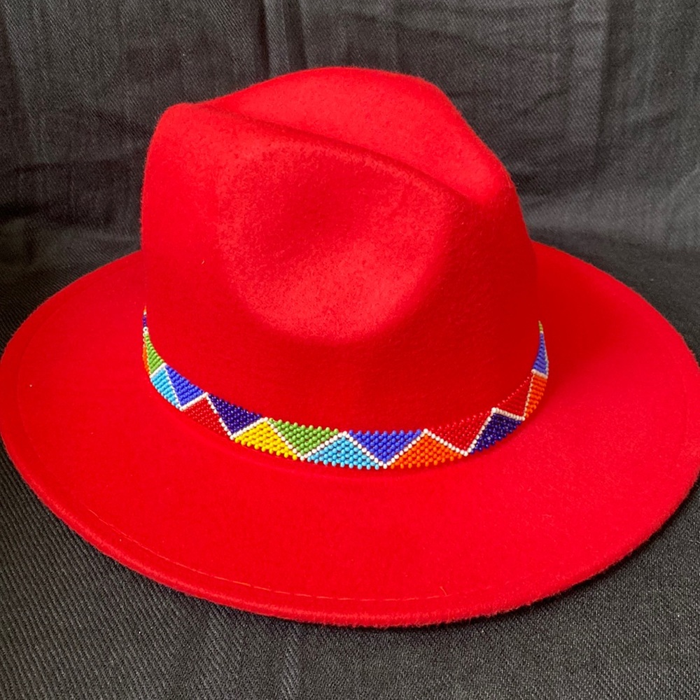 Firm Price- One size fits all hats adjustable hats with African Beading!